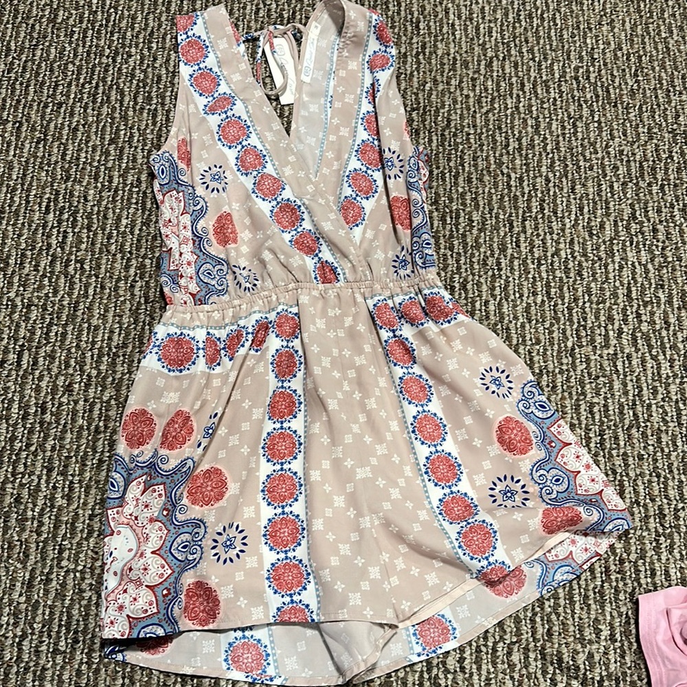 Size medium brand new romper